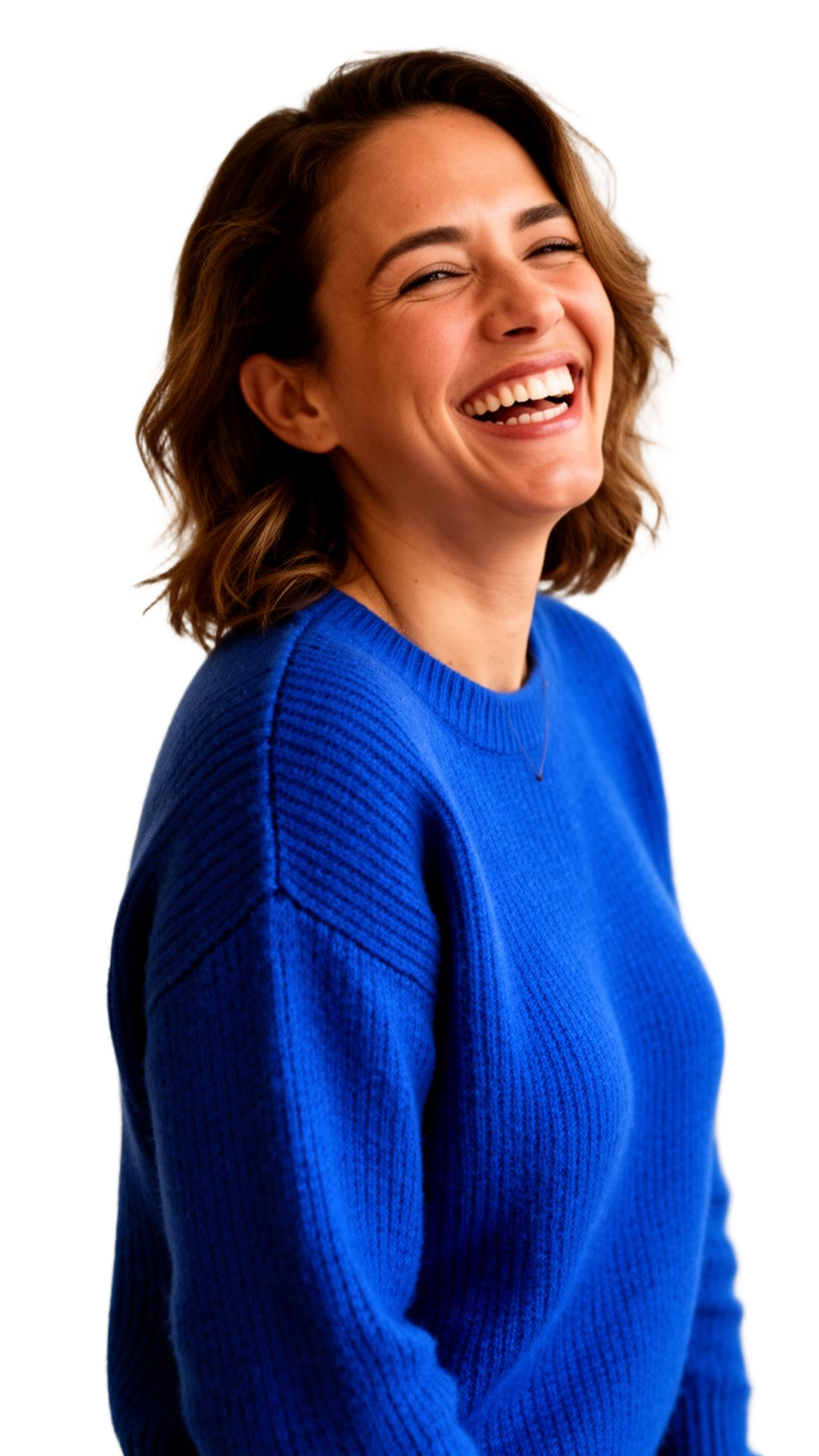 A person laughing in a cobalt blue sweater